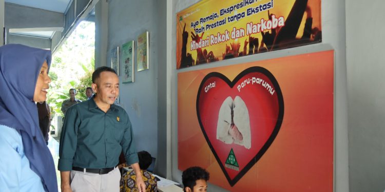 LINDUNGI ANAK DARI PAPARAN ZAT ADIKTIF DENGAN IMPLEMENTASI KAWASAN TANPA ROKOK
